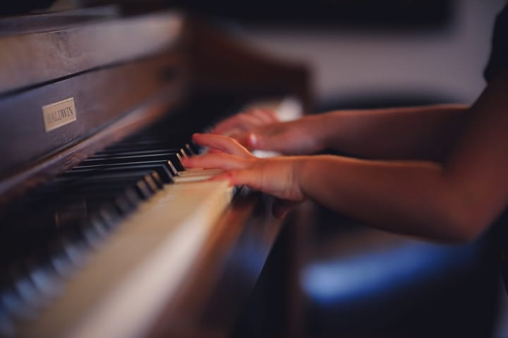 Child playing the piano