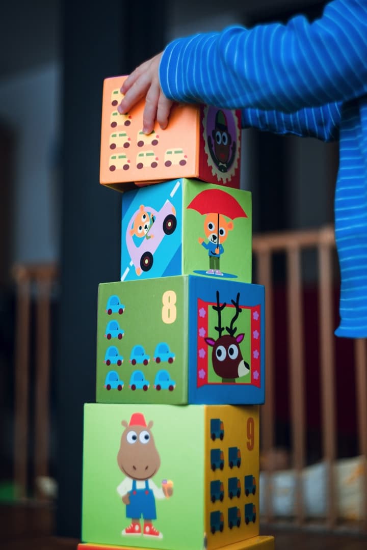 Child playing with boxes